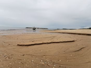 Beach during ebb tide, sea beach on weekday