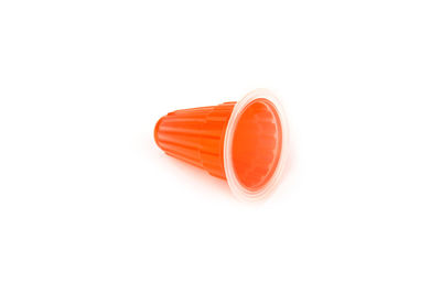 High angle view of red light over white background