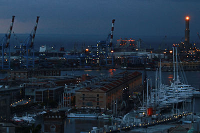 Aerial view of illuminated city at night