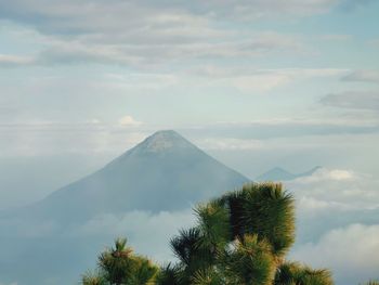 In the top of an inactive volcano, waiting for the clouds to disperse