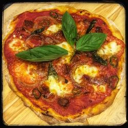 Close-up of pizza served in plate