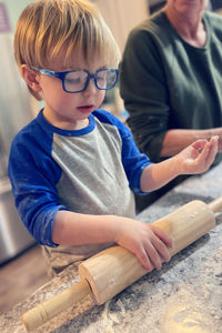 Close-up of boy playing with toy