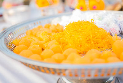 High angle view of orange in bowl on table