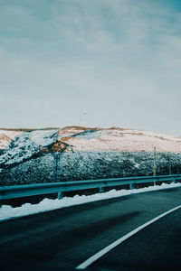 Road against sky during winter