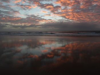 Scenic view of sea against sky at sunset