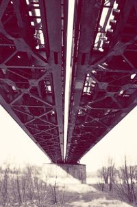 Bridge over snow covered landscape