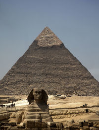 Stone wall in desert against clear sky
