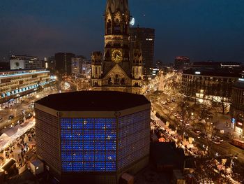 Illuminated buildings in city at night