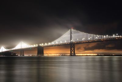 View of suspension bridge at night