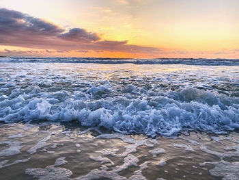 Scenic view of sea against sky during sunset