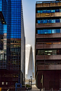 Low angle view of modern buildings against sky