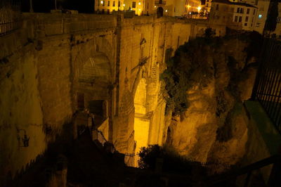 Buildings in city at night