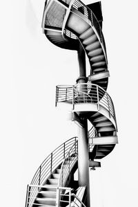 Low angle view of spiral staircase against sky