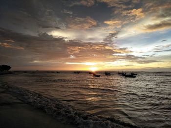 Scenic view of sea against sky during sunset