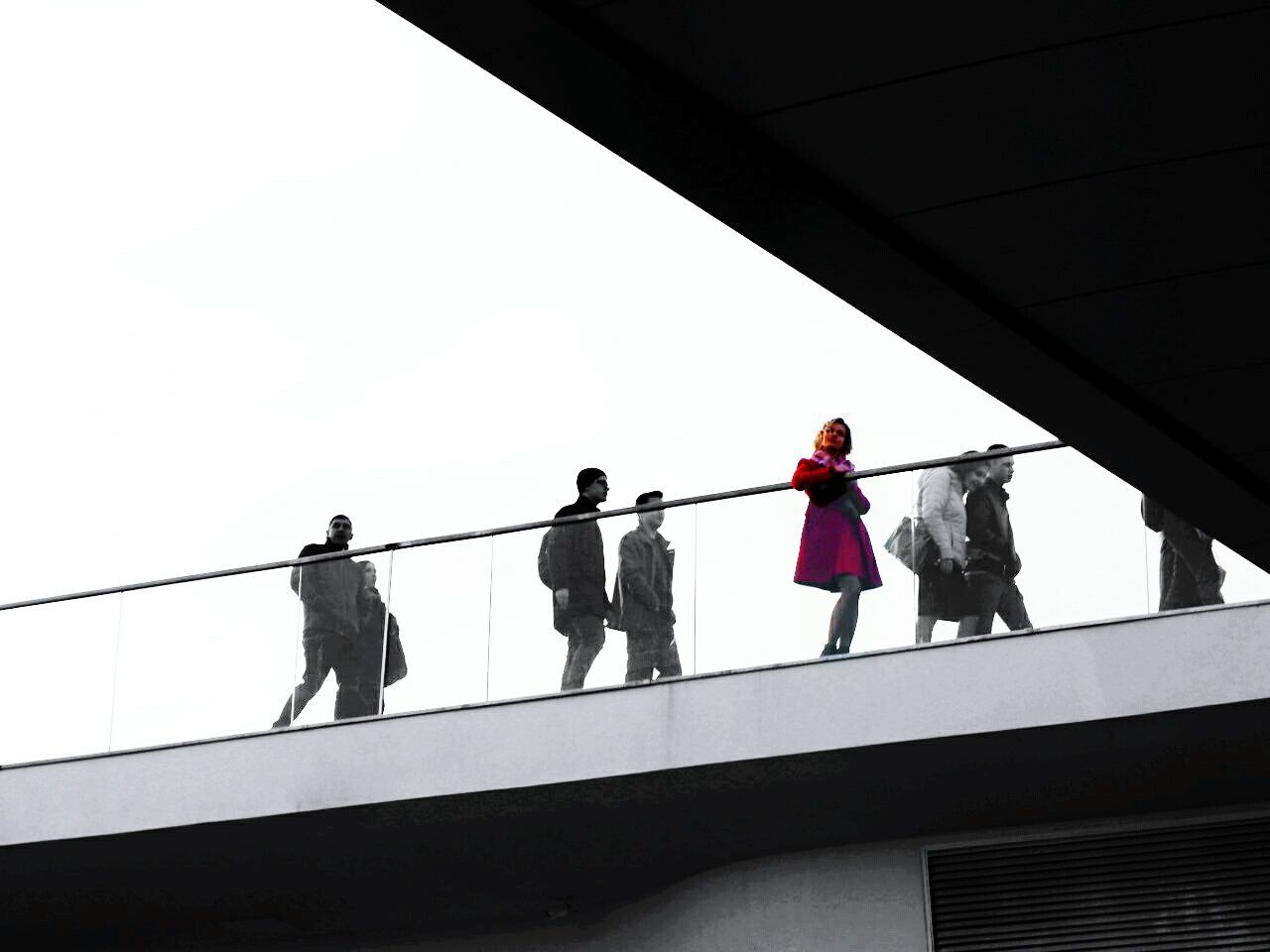 railing, real people, architecture, group of people, low angle view, built structure, clear sky, day, women, sky, people, men, lifestyles, nature, standing, walking, adult, connection, bridge, outdoors