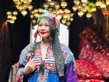 Smiling woman wearing traditional clothing