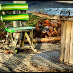 High angle view of wooden bench