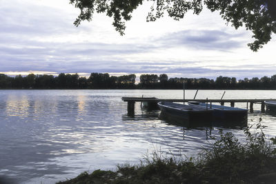 Boat in lake against sky