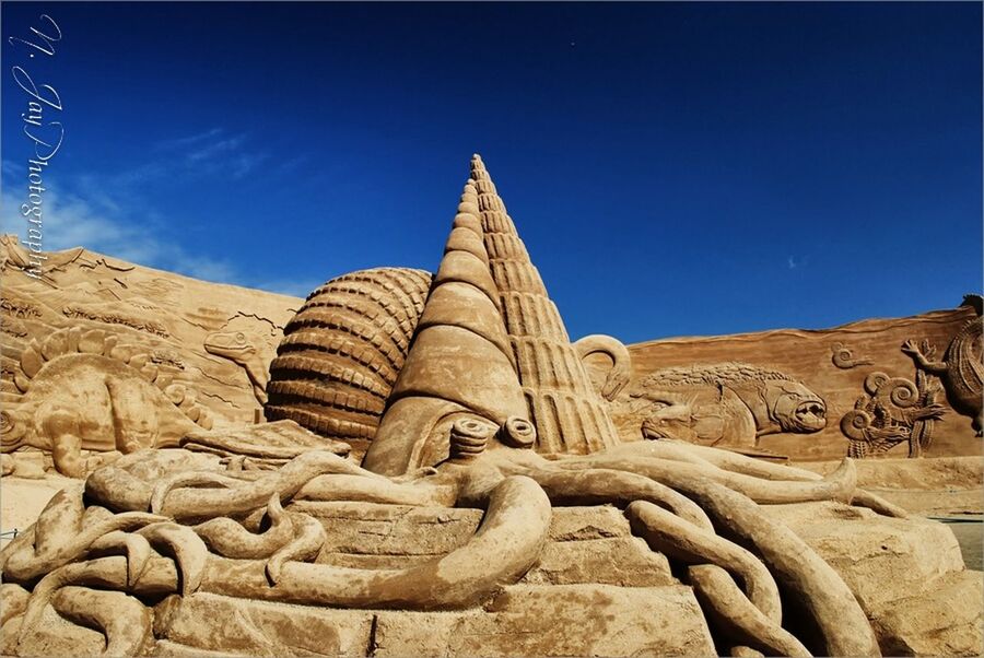 low angle view, ancient, history, blue, sky, ancient civilization, famous place, clear sky, travel destinations, archaeology, old ruin, art and craft, stone material, stone, travel, the past, sunlight, sculpture, art, tourism