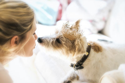Close-up of woman with dog