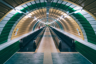 Low angle view of escalator in subway station