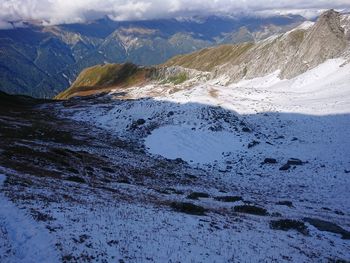 View from katitsvera pass in racha, georgia, heart shape frozen lake. 