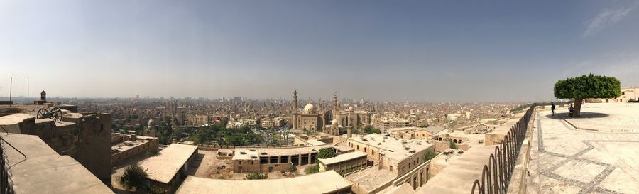 High angle view of city buildings against sky