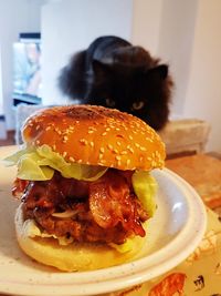 Close-up of burger in plate on table