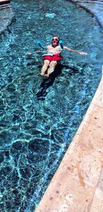 High angle view of man in swimming pool