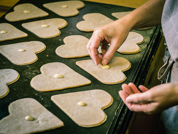 High angle view of man preparing food