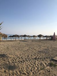 Scenic view of beach against clear sky