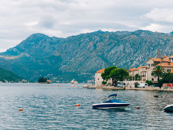 Scenic view of sea against mountain