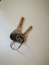 Close-up of metal over white background