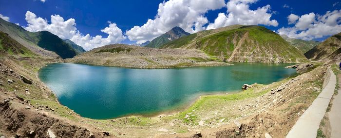 Panoramic view of lake and mountains against sky