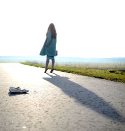 Woman walking on beach