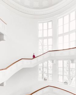Man in corridor of building
