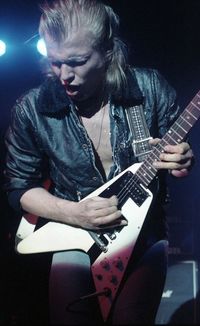 Young woman playing guitar