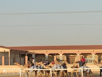 Group of people in front of building