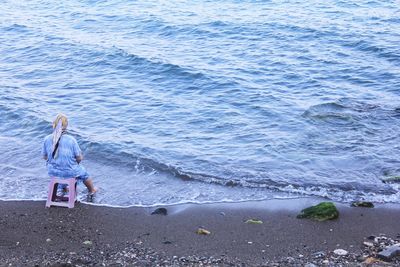 Woman standing on beach