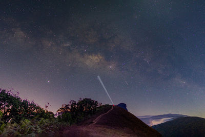 Scenic view of star field against sky at night