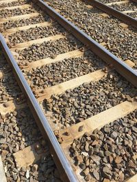 High angle view of railroad track in sunny day