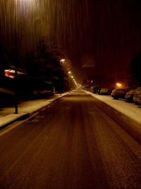 Illuminated street lights at night