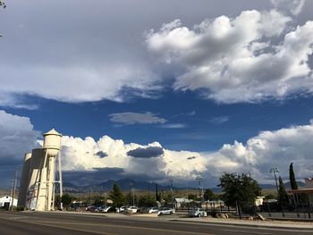 Street against cloudy sky