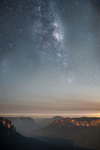 Scenic view of star field against sky at night