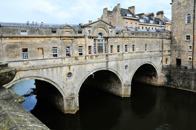 Photo of an ancient stone bridge in bath, england