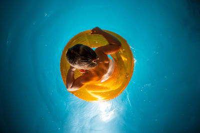 Directly above shot of girl in swimming pool