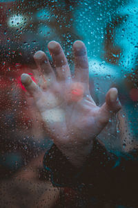 Close-up of raindrops on glass window