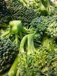 Close-up of broccolis for sale at market stall