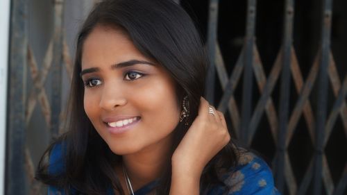 Portrait of smiling young woman