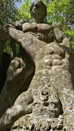 Low angle view of statue on rock